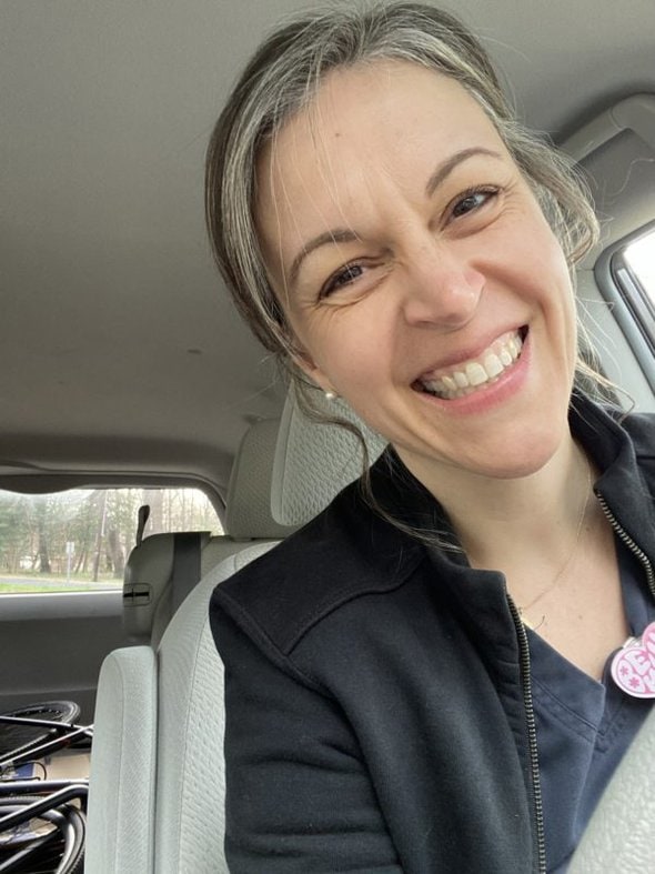 Kristen in a black jacket.